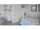 Bright bedroom features a closet, surf themed bedding, and neutral paint at 404 Taylor Groves Dr, Lake Wales, FL 33853