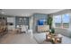 Open-concept living area with a dining space, modern decor, and ample natural light at 404 Taylor Groves Dr, Lake Wales, FL 33853