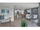 Bright living space with an open floor plan, white kitchen, and stylish dining area at 404 Taylor Groves Dr, Lake Wales, FL 33853