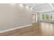 Bright bedroom with wood floors, ample natural light, and contemporary design offering a serene retreat at 4047 Isabella Cir, Windermere, FL 34786