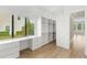 Well-organized walk-in closet with custom shelving and a built-in desk area at 4047 Isabella Cir, Windermere, FL 34786