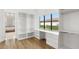 Bright closet space featuring custom built-ins and a built-in desk area at 4047 Isabella Cir, Windermere, FL 34786