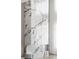 Close-up of the modern marble fireplace with sleek design and a view of the elegant curtains at 4047 Isabella Cir, Windermere, FL 34786