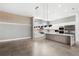 Modern kitchen featuring stainless steel appliances, a large island, and custom cabinets with a sleek design at 4047 Isabella Cir, Windermere, FL 34786