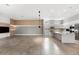 Open floor plan seamlessly connects the modern kitchen with the living room, showcasing a stylish and spacious design at 4047 Isabella Cir, Windermere, FL 34786
