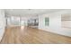 Open living area features wood floors, natural light, and modern design elements at 4047 Isabella Cir, Windermere, FL 34786