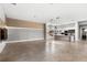 Modern open-concept space features an island kitchen and an integrated entertainment center at 4047 Isabella Cir, Windermere, FL 34786