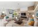Modern living room features recessed lights, sleek furniture, and a view to the backyard at 4047 Isabella Cir, Windermere, FL 34786