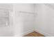 Walk-in closet with wire shelving and glass shower at 4047 Isabella Cir, Windermere, FL 34786
