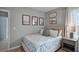 Bedroom features gray walls, carpet, and surf themed decorations at 408 Taylor Groves Dr, Lake Wales, FL 33853