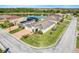 Beautiful aerial shot of a single Gathering home with a lake in the background at 428 Bel Air Way, Kissimmee, FL 34759