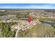 Aerial view of a beautiful community surrounded by natural beauty and serene lakes at 428 Bel Air Way, Kissimmee, FL 34759