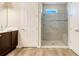Modern bathroom featuring a glass-enclosed shower, providing a spa-like experience at 428 Bel Air Way, Kissimmee, FL 34759