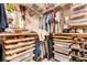 Organized walk-in closet with ample shelving, hanging rods, and storage solutions for clothing and accessories at 428 Bel Air Way, Kissimmee, FL 34759