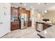 Kitchen featuring stainless steel appliances, granite countertops, and ample cabinet space at 428 Bel Air Way, Kissimmee, FL 34759