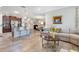An open concept living space flows from a modern kitchen to a comfortable living room at 428 Bel Air Way, Kissimmee, FL 34759