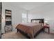 Charming bedroom with a comfortable bed, side tables, and stylish decorations for a peaceful retreat at 4338 Davos Dr, Clermont, FL 34711