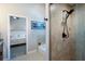 Bathroom showcasing a tiled shower, soaking tub, and access to the bedroom at 4819 Shoreline Cir, Sanford, FL 32771