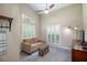 Bedroom featuring a sitting area with a comfortable couch and vaulted ceilings at 4819 Shoreline Cir, Sanford, FL 32771
