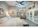 Bright main bedroom with pool views, plush carpeting, and a comfortable seating area at 4819 Shoreline Cir, Sanford, FL 32771