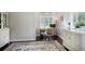 Bright office space with hardwood floors, a neutral rug, and ample natural light at 4819 Shoreline Cir, Sanford, FL 32771