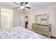 Bright bedroom showing ensuite bath and view to living room at 4833 Cypress Woods Dr # 4101, Orlando, FL 32811