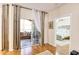 Welcoming living room features sliding door to an outdoor patio with a view to a comfortable bedroom at 4833 Cypress Woods Dr # 4101, Orlando, FL 32811