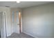 Neutral bedroom featuring carpet, a closet, an interior door, and light-colored walls at 5099 Prairie Preserve Run, St Cloud, FL 34772