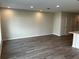 Open living space featuring tile floors and neutral walls at 5099 Prairie Preserve Run, St Cloud, FL 34772