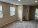 Spare bedroom featuring carpet, natural light and two windows at 5103 Prairie Preserve Run, St Cloud, FL 34772