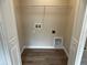 This laundry room has wood-look flooring and a utility sink hook-up at 5103 Prairie Preserve Run, St Cloud, FL 34772
