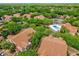 Community with mature landscaping, a pool, and a tennis court at 5452 E Michigan St # 7, Orlando, FL 32812