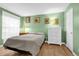 Cozy bedroom with ample natural light, hardwood floor and a spacious layout at 5452 E Michigan St # 7, Orlando, FL 32812