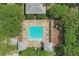 Birds eye view of resort-style pool, cabanas, and playground area at 5489 Baldwin Park St, Orlando, FL 32814