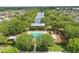 Overhead view of community pool, recreation area and long lake at 5489 Baldwin Park St, Orlando, FL 32814