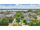 Aerial view highlights the community's lake views and well-maintained landscaping at 5489 Baldwin Park St, Orlando, FL 32814