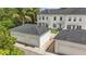 Aerial view of townhomes with private garages and well-maintained landscaping at 5489 Baldwin Park St, Orlando, FL 32814
