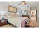 Comfortable primary bedroom featuring a decorative bed and neutral color palette at 5489 Baldwin Park St, Orlando, FL 32814