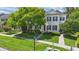Beautiful townhome featuring manicured lawn and mature trees at 5489 Baldwin Park St, Orlando, FL 32814