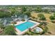 Aerial view showcasing the community pool, ' pool, recreation center, and green space at 5489 Baldwin Park St, Orlando, FL 32814