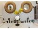 Bathroom featuring double vanity sinks and decorative round mirrors at 550 Birch Ct, Altamonte Springs, FL 32714