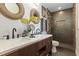 Modern bathroom with double sinks and a tiled shower at 550 Birch Ct, Altamonte Springs, FL 32714