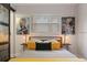 Bedroom with brightly lit window and colorful, modern decor at 550 Birch Ct, Altamonte Springs, FL 32714