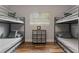 Cozy bedroom with two twin bunk beds and modern industrial decor at 550 Birch Ct, Altamonte Springs, FL 32714