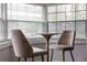 Cozy breakfast nook with large windows and comfortable seating at 550 Birch Ct, Altamonte Springs, FL 32714