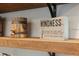 Wooden shelves showcase rustic decor in this modern kitchen at 550 Birch Ct, Altamonte Springs, FL 32714
