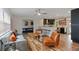 Spacious living room showcasing modern furnishings and an open floor plan to the kitchen at 550 Birch Ct, Altamonte Springs, FL 32714