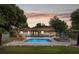 Inviting backyard pool with ample patio space, perfect for outdoor entertaining and relaxation at 550 Birch Ct, Altamonte Springs, FL 32714