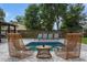 Inviting pool area with modern lounge chairs and stylish wicker chairs at 550 Birch Ct, Altamonte Springs, FL 32714