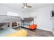 Shared bedroom features two bunk beds, a ceiling fan, and an accent bench at 631 Trailwood Dr, Altamonte Springs, FL 32714